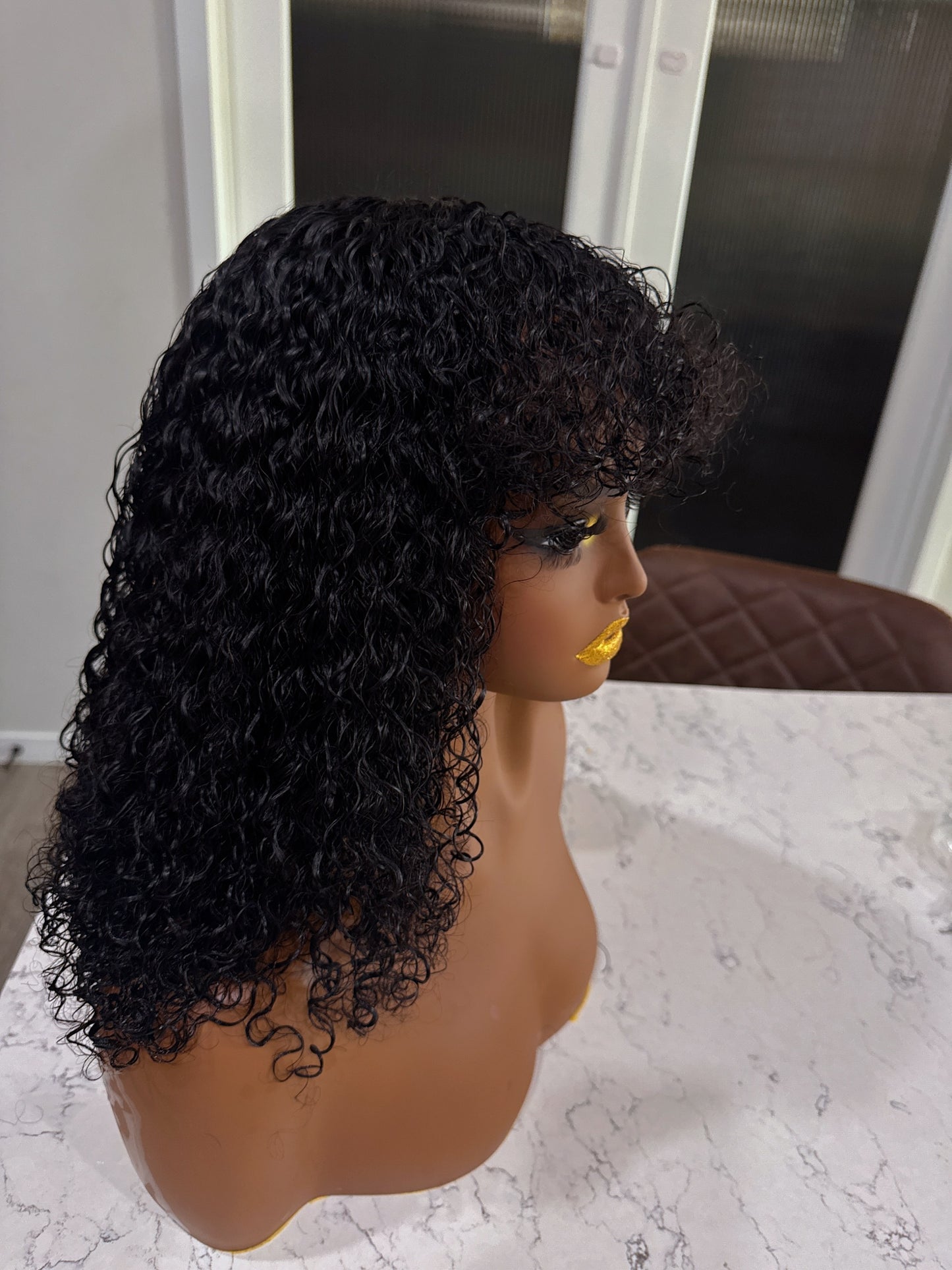 natural black curly wig with fringe soft defined curls shoulder length